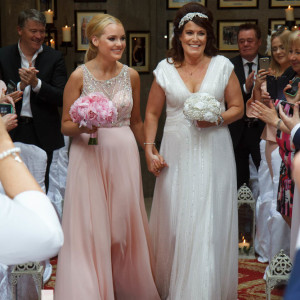 bride and daughter coming up the aisle