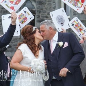 bride and groom and playiing cards