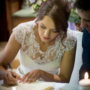 Bride signing register